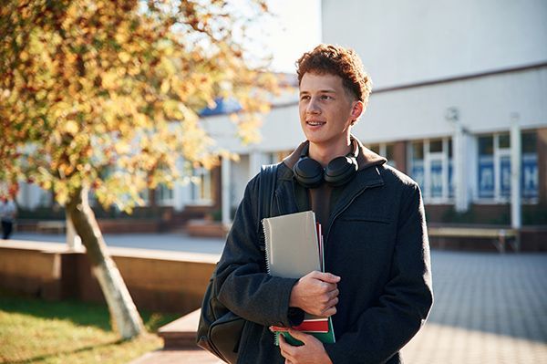 young-student-is-outside-the-university-in-black-2023-11-29-16-40-46-utc.JPG