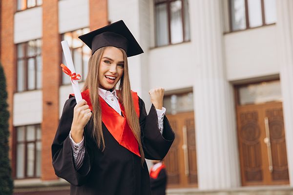 cheerful-woman-graduate-celebrating-with-diploma-i-2024-10-03-20-26-17-utc.jpg