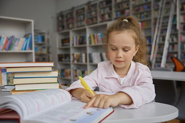 little-preschool-girl-child-studying-at-library-ov-2024-12-05-23-17-44-utc.jpg