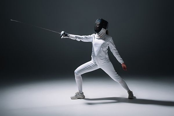 fencer-training-with-rapier-on-white-surface-on-bl-2024-11-08-17-09-15-utc.jpg