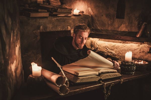 monk-chronicler-writes-an-ancient-manuscript-2024-10-17-02-30-14-utc.jpg