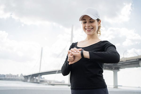 a-woman-is-using-a-fitness-bracelet-watch-app-on-h-2023-11-27-05-23-45-utc.JPG