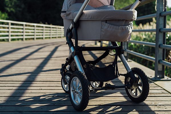 baby-stroller-on-running-path-in-park-2023-11-27-05-13-02-utc.jpg