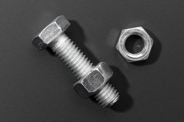 bolt-and-nut-isolated-on-black-background-2023-11-27-05-01-43-utc.jpg