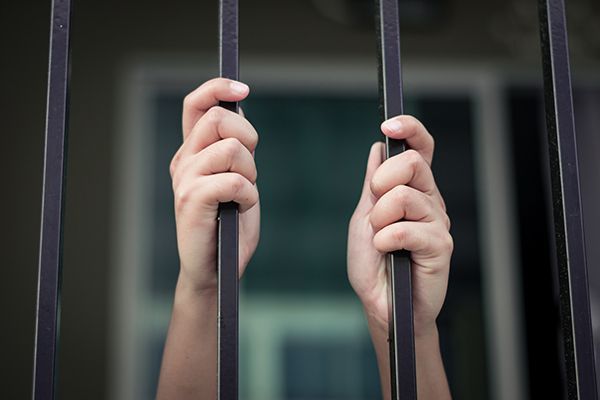 girl-hands-on-bar-metal-fence-in-violence-view-pri-2024-11-27-20-00-44-utc.jpg