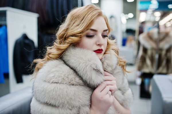 elegance-blonde-girl-in-fur-coat-at-the-store-of-f-2023-11-27-05-23-35-utc.jpg