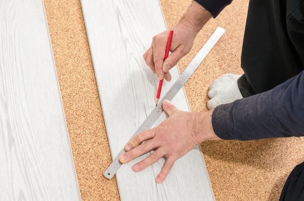 unrecognizable-man-laying-laminate-flooring-profe-2024-12-07-01-37-36-utc.jpg