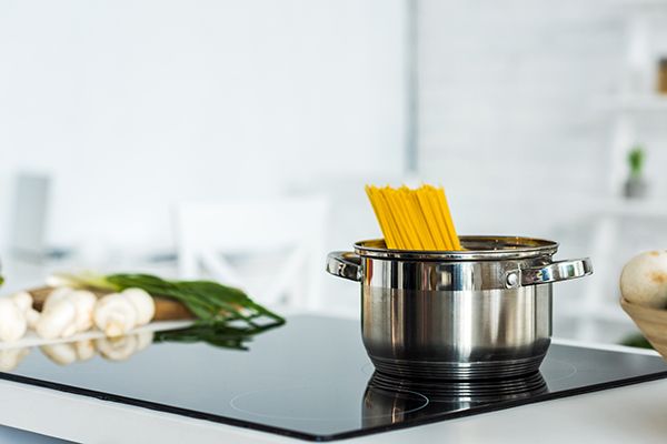 pan-with-pasta-on-clean-electric-stove-in-kitchen-2024-11-18-11-20-09-utc.jpg