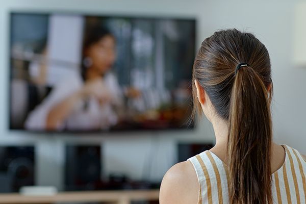 woman-watch-tv-at-home-2023-11-27-04-53-14-utc.jpg
