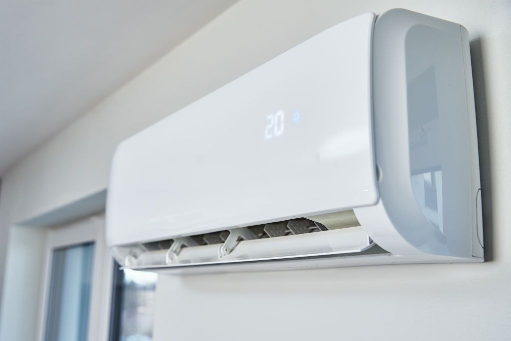 air-conditioner-hanging-on-the-wall-close-up-2023-11-27-04-55-11-utc.jpg