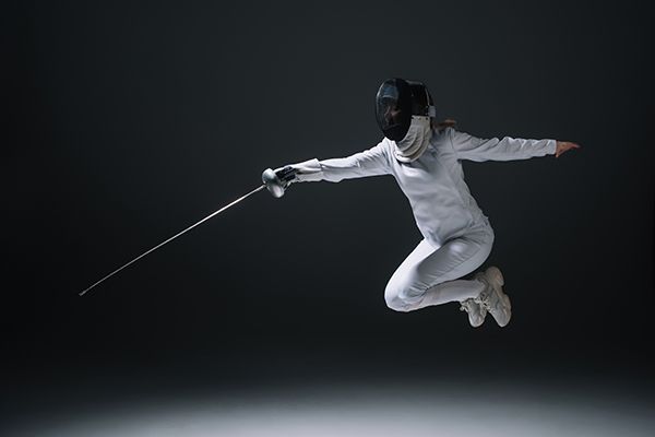 fencer-holding-rapier-while-jumping-isolated-on-bl-2024-11-15-03-34-34-utc.jpg