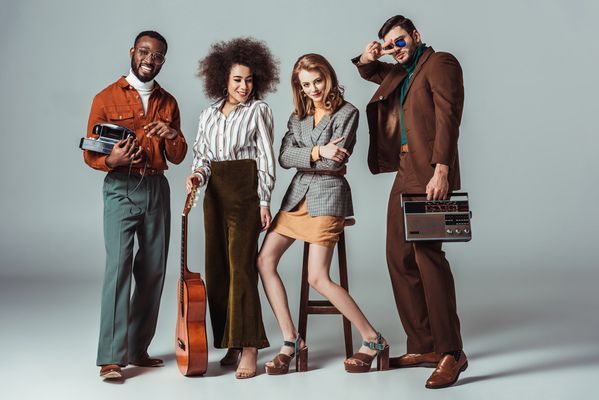 multiethnic-retro-styled-friends-with-guitar-and-v-2024-11-19-18-39-29-utc.jpg