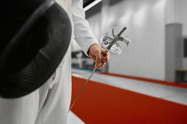 selective-focus-on-protective-fencing-mask-in-hand-2024-11-27-17-56-28-utc.jpg