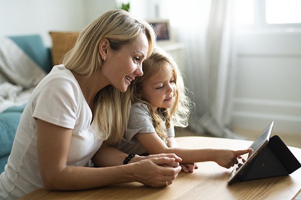 mom-and-daughter-watching-a-cartoon-on-a-digital-t-2023-11-27-04-59-42-utc.jpg