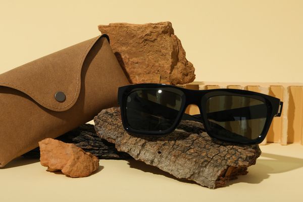 glasses-in-natural-textures-stones-wood-on-a-li-2023-11-27-05-25-43-utc.jpg