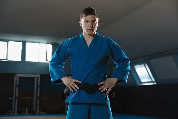young-judo-fighter-in-kimono-posing-comfident-in-t-2024-10-11-15-42-48-utc.jpg